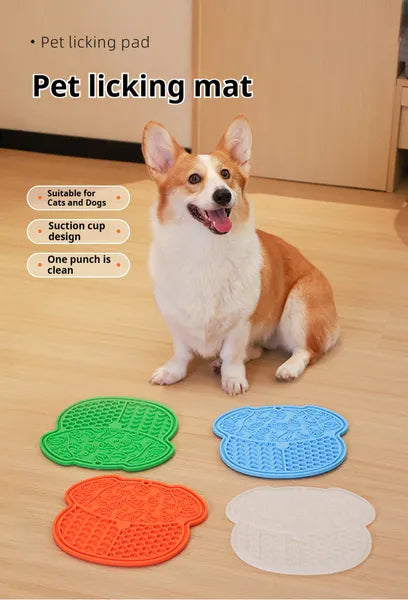 Dog eating from a textured slow feeder lick mat